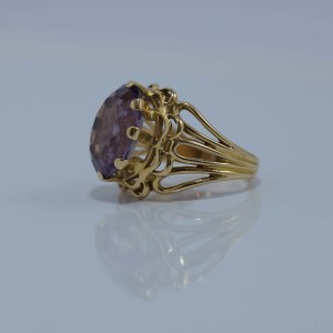 Bague d'occasion en or jaune ornée d'une améthyste
